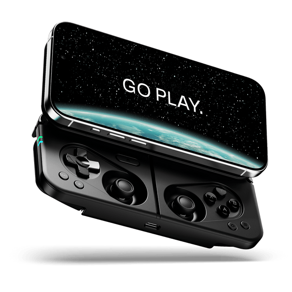 Black magnetic mobile controller attached to a phone