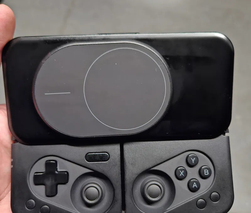 Customer holding the controller with a phone attached